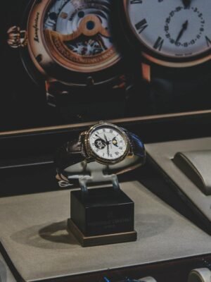 Elegant luxury wristwatches displayed in a sophisticated store with a focus on craftsmanship.
